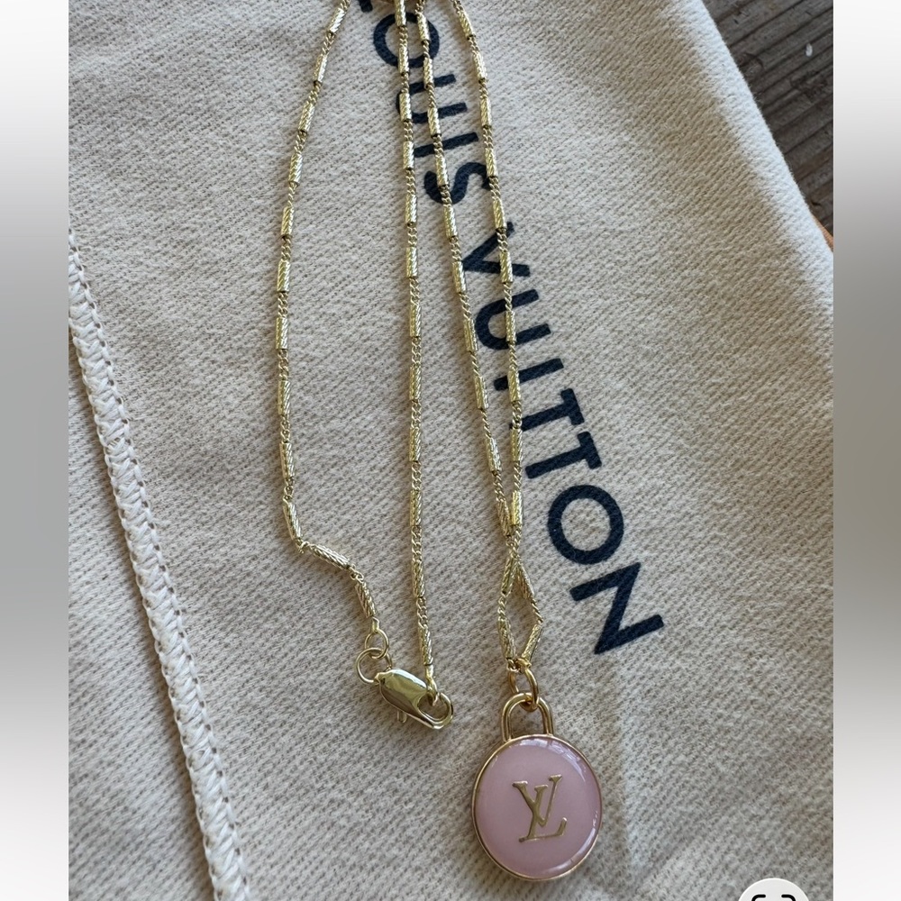 LV luxury pink enameled pendant and gold tone chain 18 in.